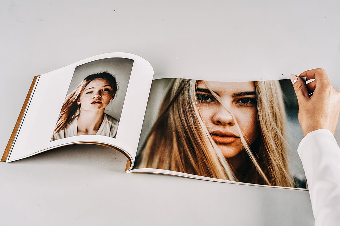 A soft cover photobook with fashion and portrait photography